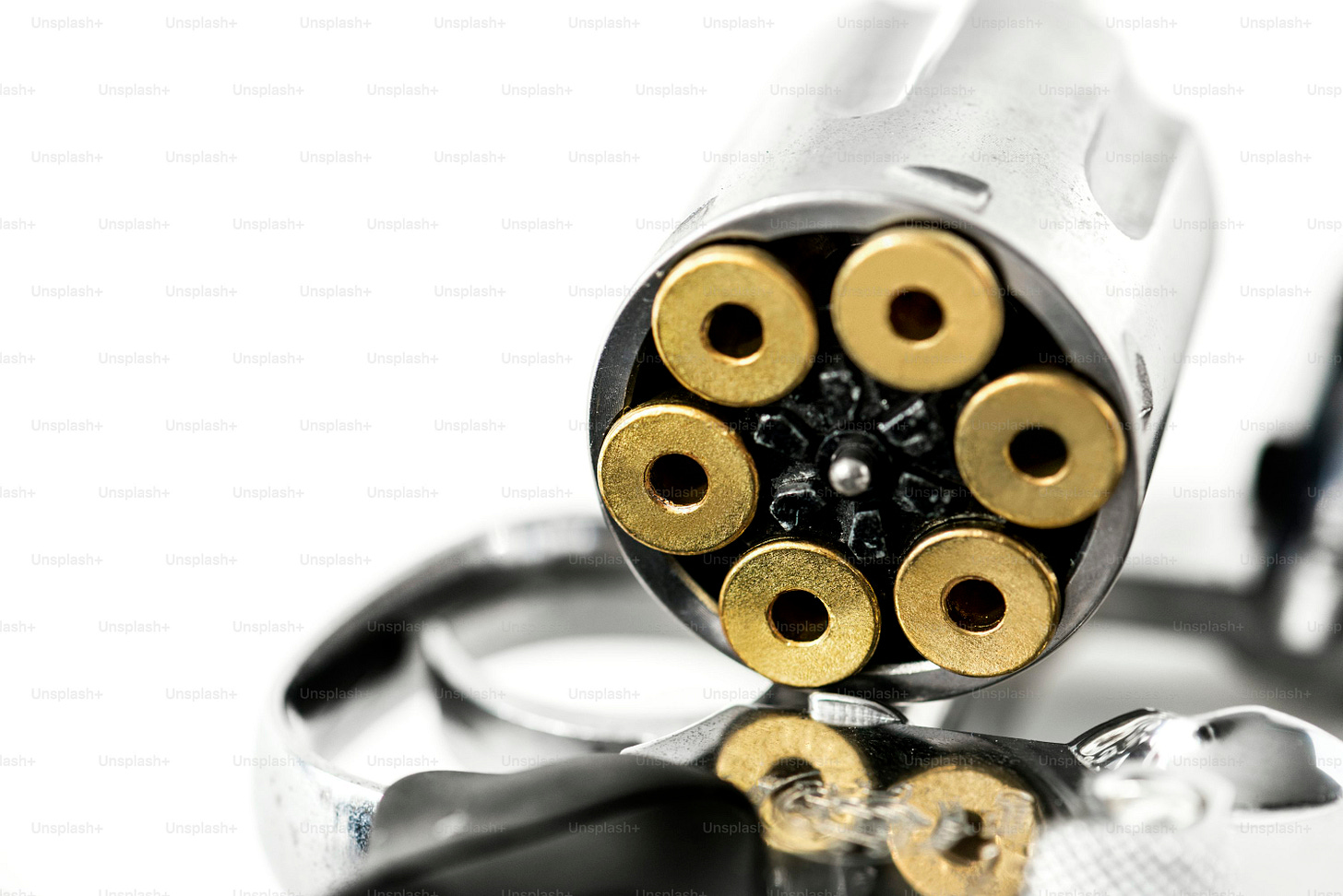 Macro shot of gun isolated on white background Macro shot of gun isolated on white background