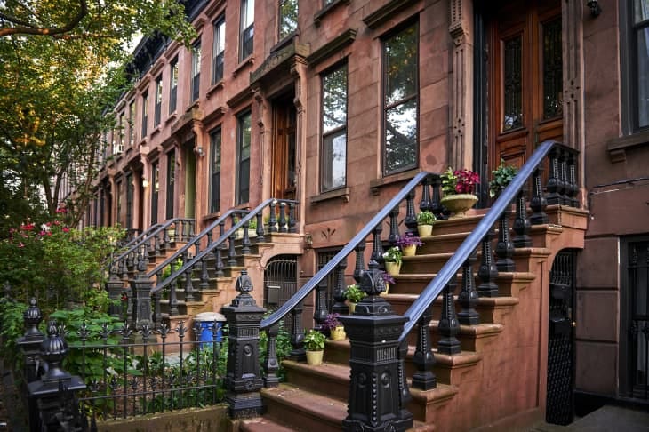 Row of historic brownstone buildings in New York City Row of historic brownstone buildings in New York City