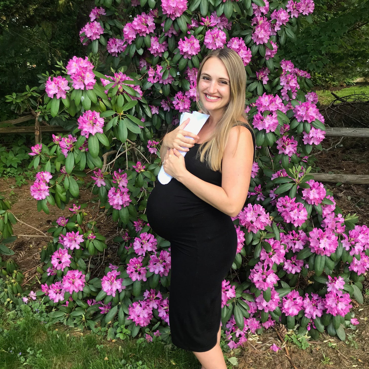 Author Amy Neff holding a draft of her manuscript for The Days I Loved You Most while pregnant. Author Amy Neff holding a draft of her manuscript for The Days I Loved You Most while pregnant.