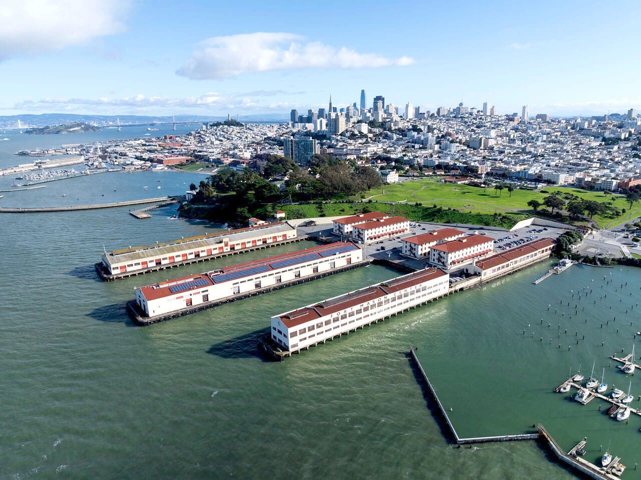 Aerial view of San Francisco waterfront and skyline showing Fort Mason and Bay Area startup ecosystem Aerial view of San Francisco waterfront and skyline showing Fort Mason and Bay Area startup ecosystem