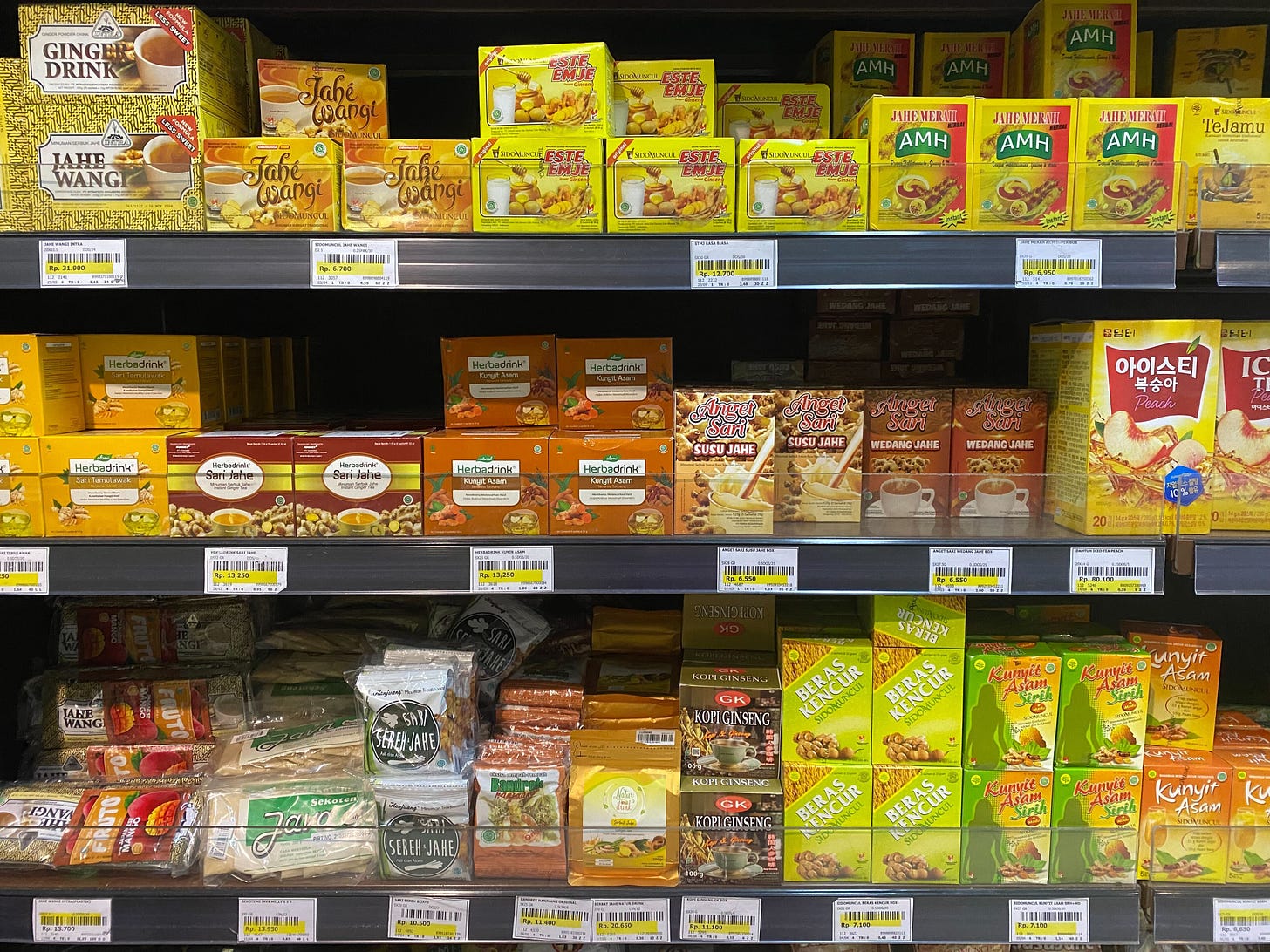 photo of cpg jamu drinks on supermarket shelf in indonesia
