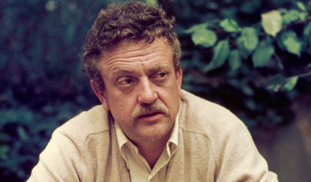 A portrait of a man in a cream cardigan with a bountiful moustache A portrait of a man in a cream cardigan with a bountiful moustache