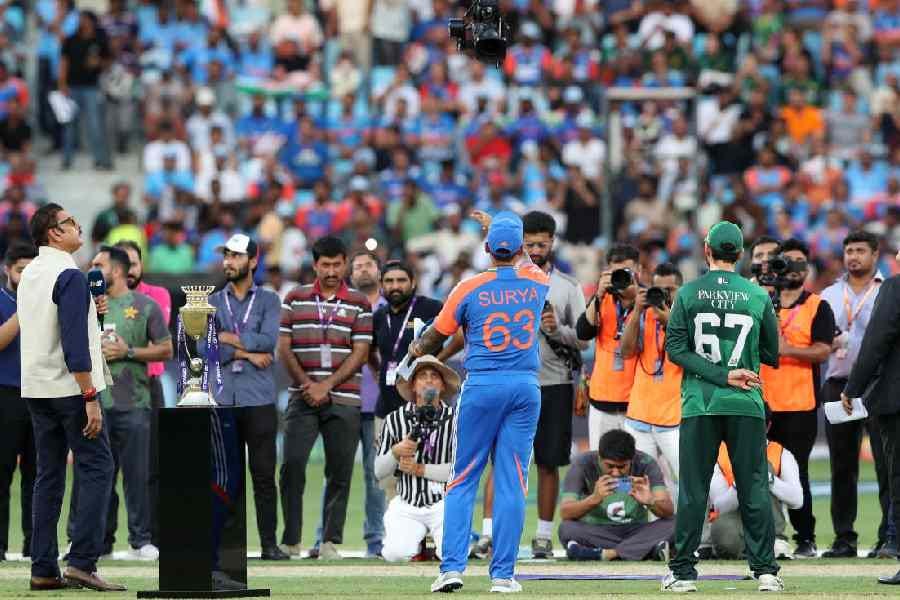Cricket - Asia Cup - Group A - India v Pakistan - Dubai International Cricket Stadium, Dubai, United Arab Emirates - September 14, 2025 India's Suryakumar Yadav and Pakistan's Salman Agha during the coin toss Cricket - Asia Cup - Group A - India v Pakistan - Dubai International Cricket Stadium, Dubai, United Arab Emirates - September 14, 2025 India's Suryakumar Yadav and Pakistan's Salman Agha during the coin toss
