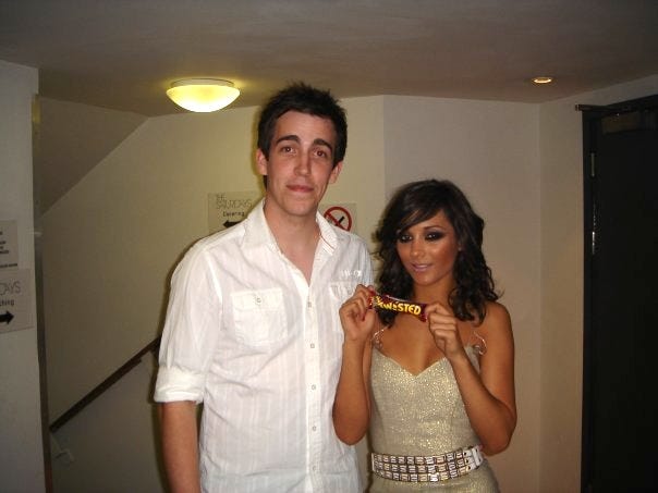 Dean and Frankie Bridge from The Saturdays. Frankie is holding a Creme Egg Twisted bar.
