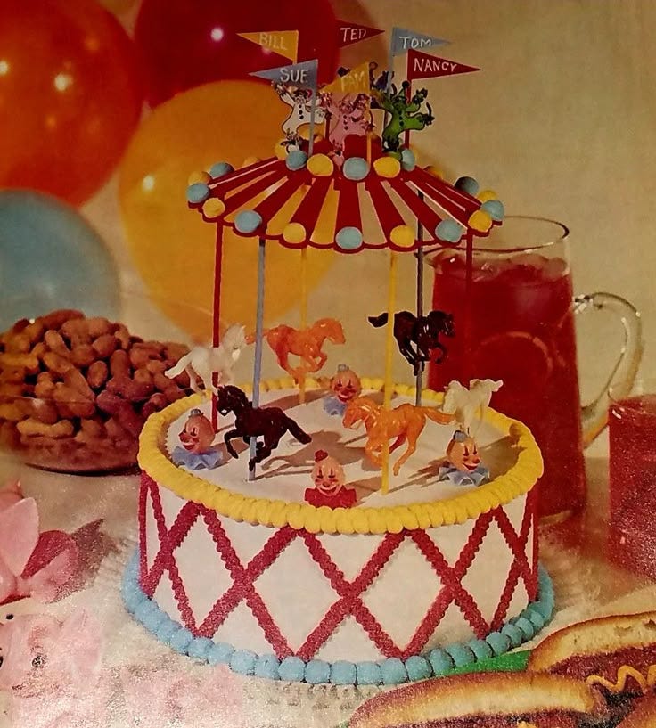 This may contain: there is a cake with horses on it and other decorations in front of the cake