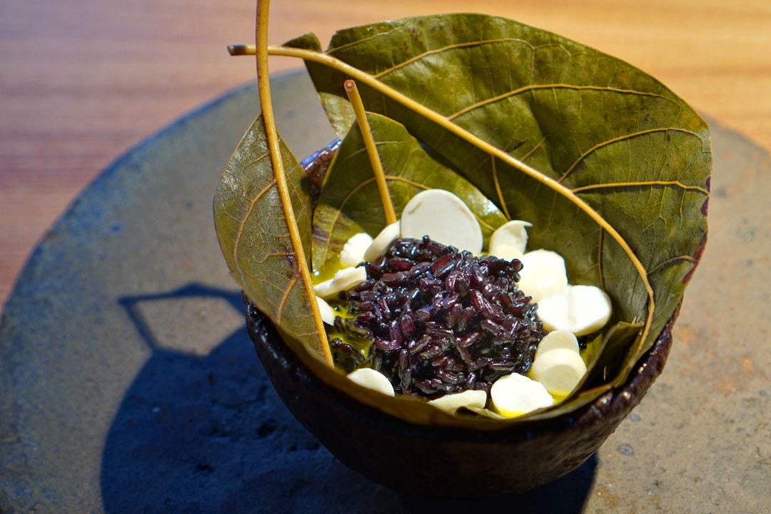 Black pearl rice steamed with avocado leaf