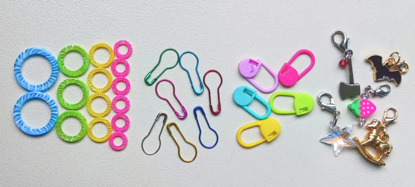 from left to right: ring markers, lightbulb pins, locking markers and progress keepers