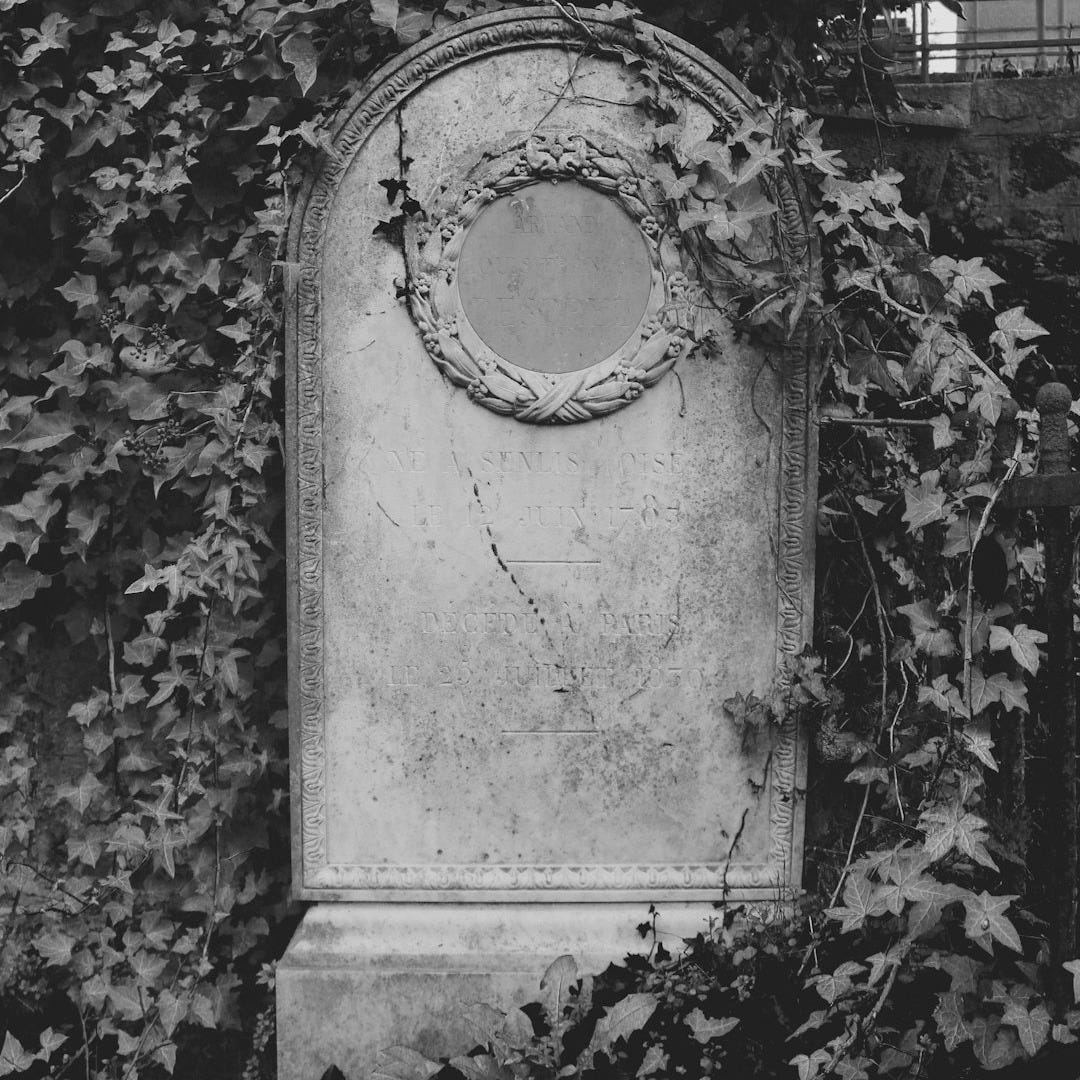 grayscale photo of concrete wall with hole
