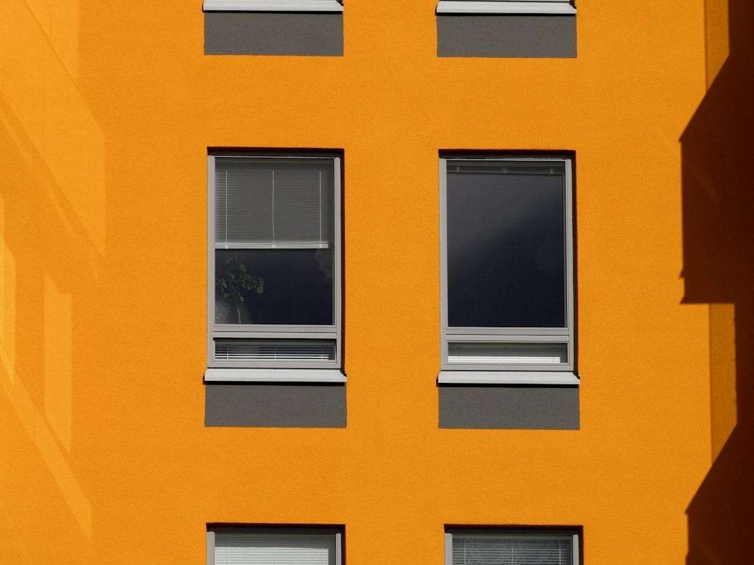white wooden framed glass window white wooden framed glass window
