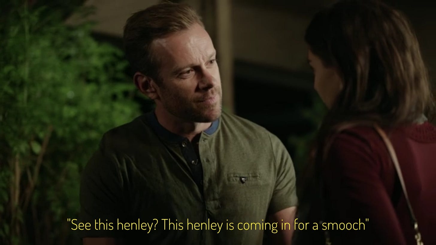 DJ, a middle-aged stubbly white man wearing a slightly fancy henley t-shirt, looking at Trish with kiss face. Captioned "'See this henley? This henley is coming in for a smooch'"