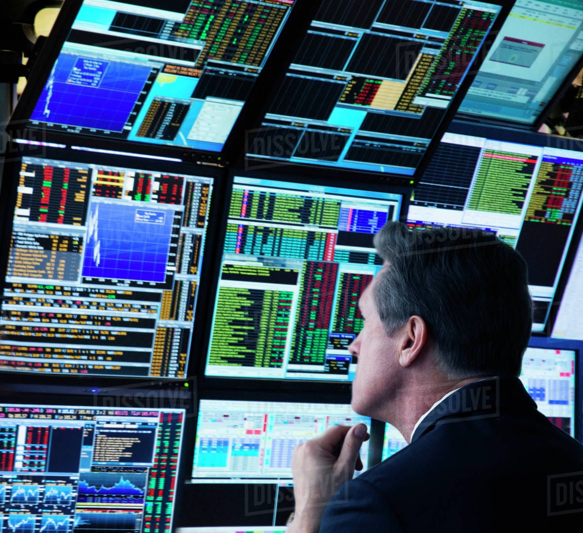 Stock trader working on computer - Stock Photo - Dissolve
