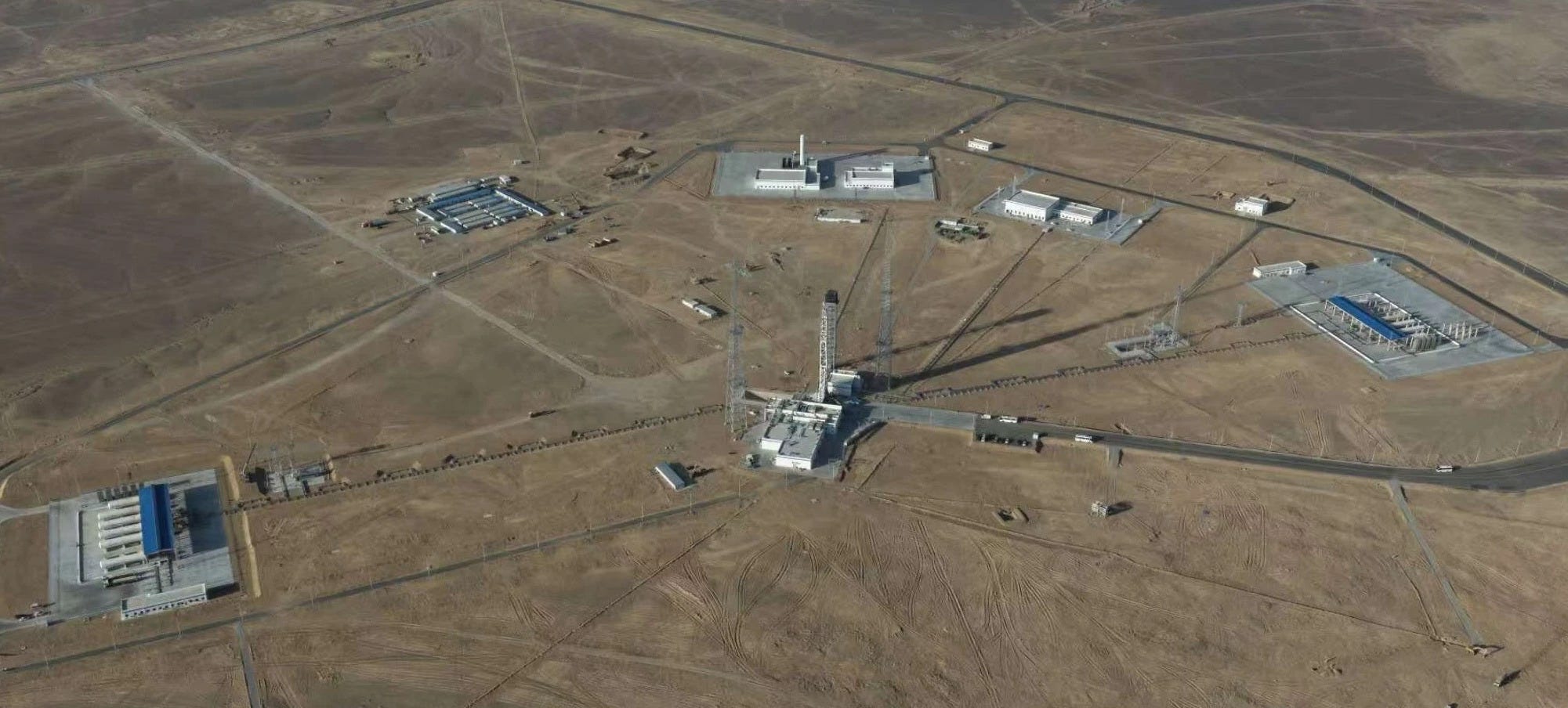 The Long March 12 launch vehicle series’ launch pad at the Jiuquan Satellite Launch Center surrounded by necessary support systems.