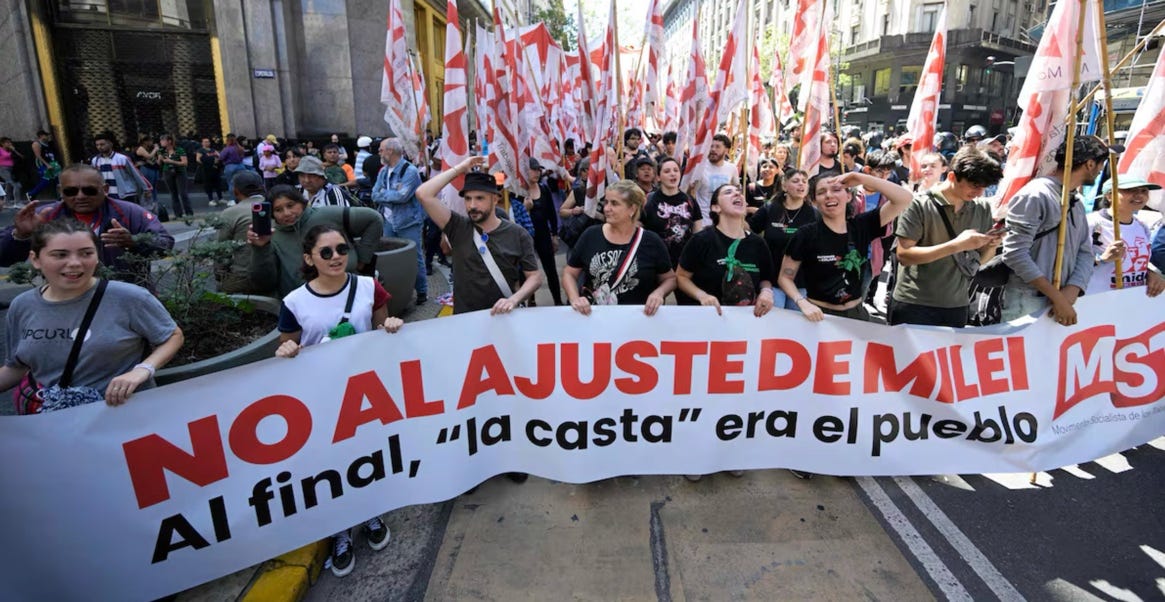 A group of people holding banners

AI-generated content may be incorrect.