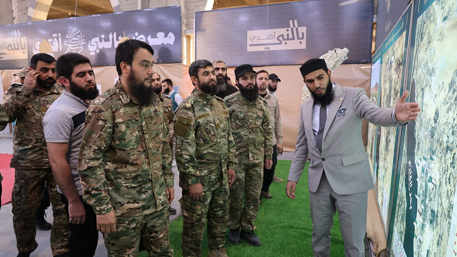 May be an image of ‎6 people and ‎text that says '‎باله مب is عنالني ام اصالله عص め منله ﷺ 選 با بالبه بالي اق دى أقدي بالتىي‎'‎‎