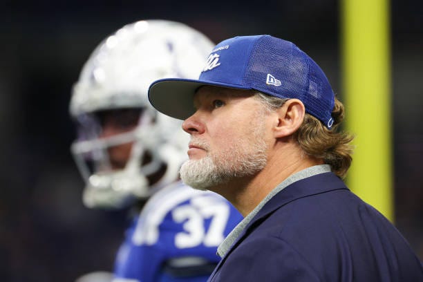Indianapolis Colts general manager Chris Ballard looks on during warm ups before the game against the Houston Texans at Lucas Oil Stadium on January...
