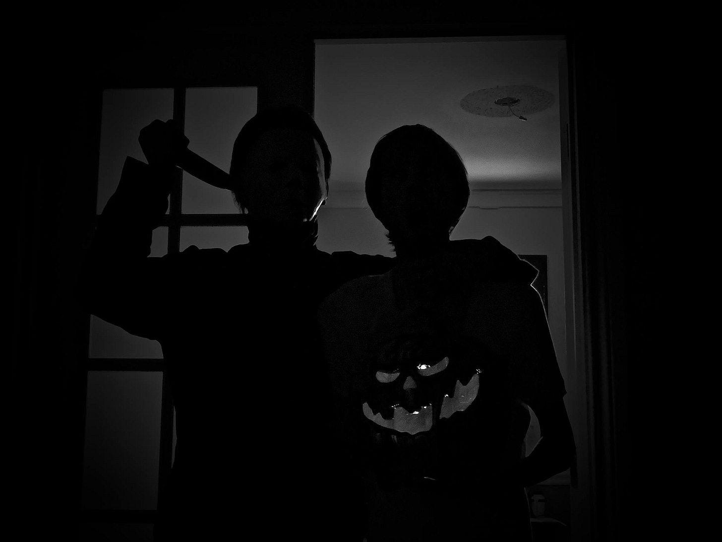 Michael Myers and one of his victims with a jack-o-lantern Michael Myers and one of his victims with a jack-o-lantern