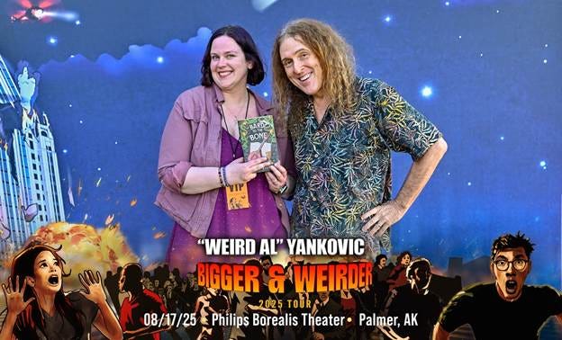 A person and person posing for a picture

AI-generated content may be incorrect.