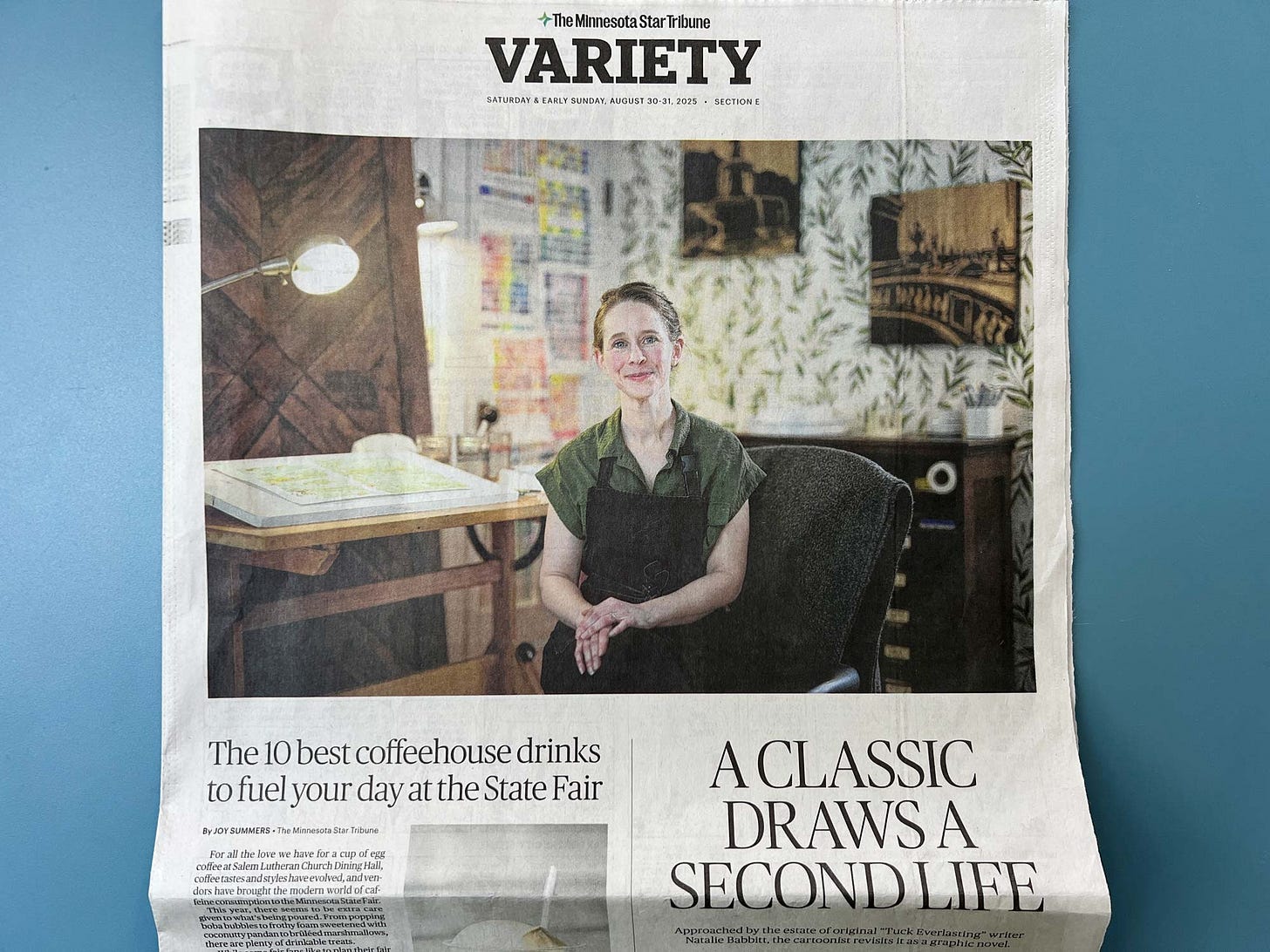Star Tribune interview of graphic novelist K. Woodman-Maynard on her upcoming graphic novel adaptation of Tuck Everlasting. Title reads: A Classic Draws a Second Life.  
