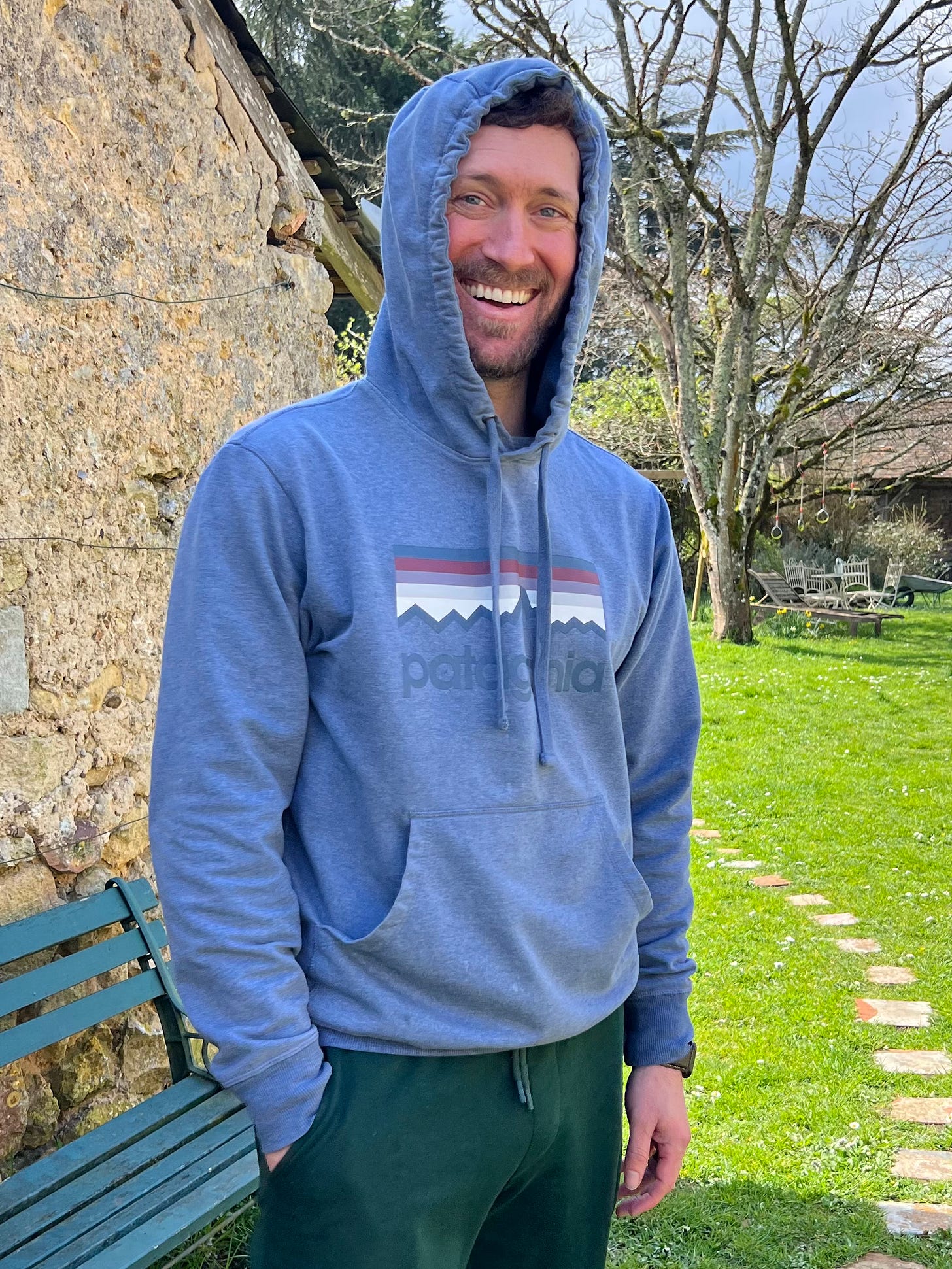 A man smiling broadly at the camera. A man smiling broadly at the camera.