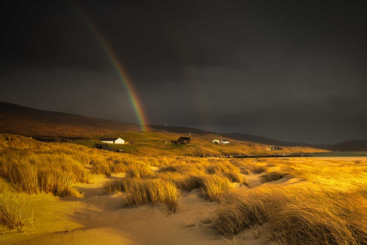 Images of sunset over the beach at Luskentyre, Isle of Harris, Scotland, including gorgeous warm light and a rainbow over the Harris Hills