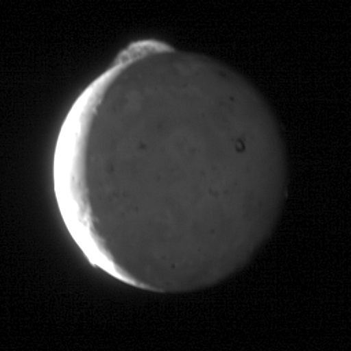 An animated GIF showing a volcanic eruption on Io, one of Jupiter's moons. The sequence captures a plume rising from the surface, illuminated by sunlight, highlighting the dynamic and active geology of the moon. The eruption is prominently visible against the dark background of space, emphasizing Io's status as the Solar System's most volcanically active body. An animated GIF showing a volcanic eruption on Io, one of Jupiter's moons. The sequence captures a plume rising from the surface, illuminated by sunlight, highlighting the dynamic and active geology of the moon. The eruption is prominently visible against the dark background of space, emphasizing Io's status as the Solar System's most volcanically active body.