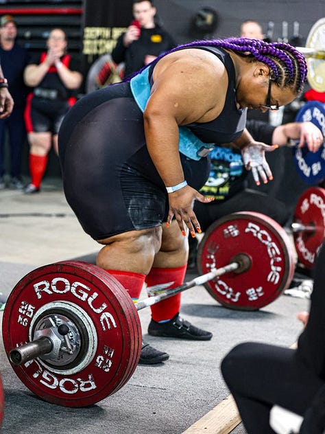 Collage of pics of Kanoelani Patterson at her 1st powerlifting meet. She has Brown Skin & Purple Braids & is wearing glasses. She is wearing a black shirt & Black singlet. Her nails are orange. She is showing squatting & deadlifting. The plates are red.