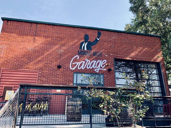 signs, lights, tables, chairs, sky