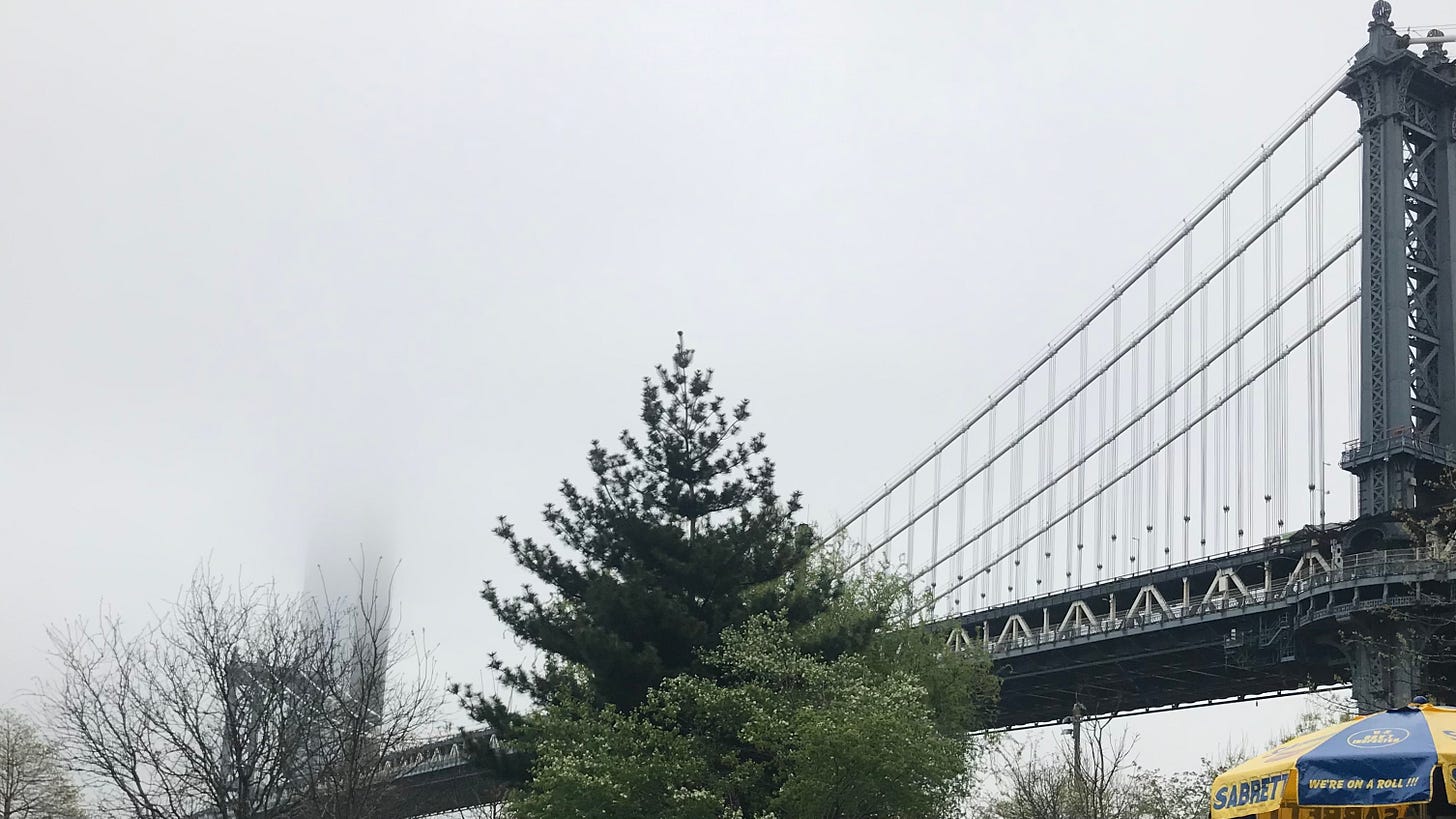 photo of a bridge with fog above it, showing a skyscraper in the distance fading invisibly into the sky photo of a bridge with fog above it, showing a skyscraper in the distance fading invisibly into the sky