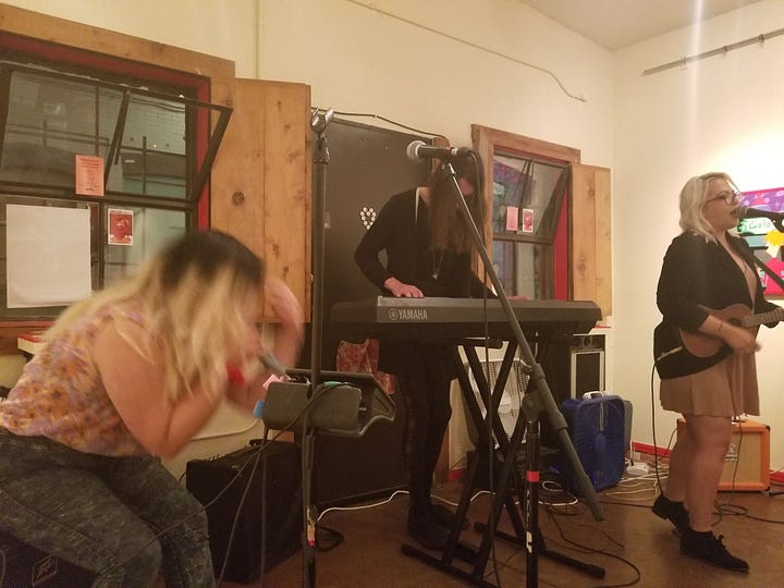 A gallery of people performing at queer open mics over the years