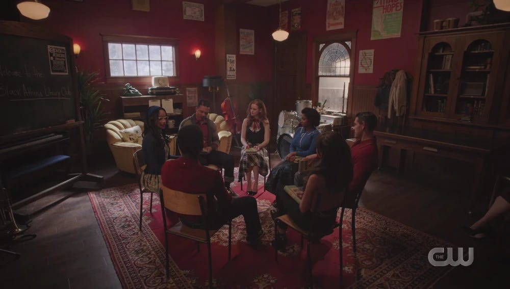 A group of 7 students in a circle.