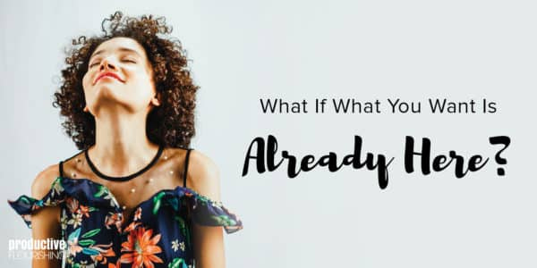 Woman with curly, short brown hair looks up at the ceiling. Text Overlay: What if what you want is already here? Woman with curly, short brown hair looks up at the ceiling. Text Overlay: What if what you want is already here?
