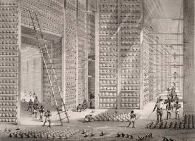 A busy stacking room in the opium factory at Patna, India.