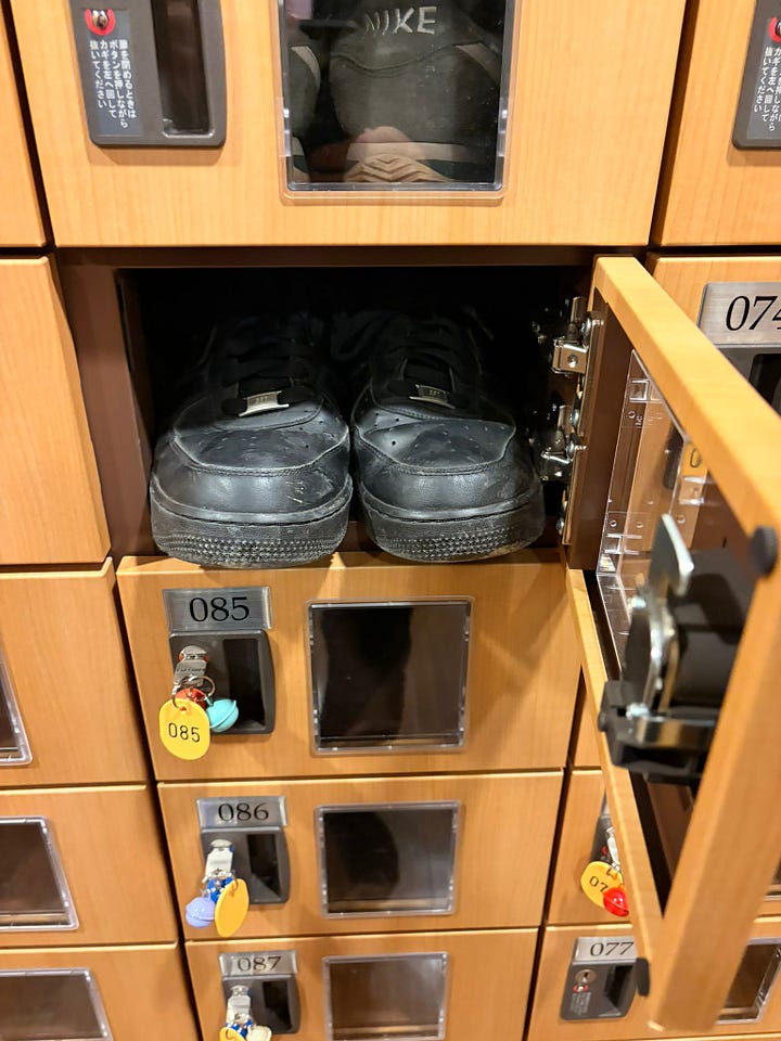 Outside the Onsen, my shoes, the telephone, all the shoes