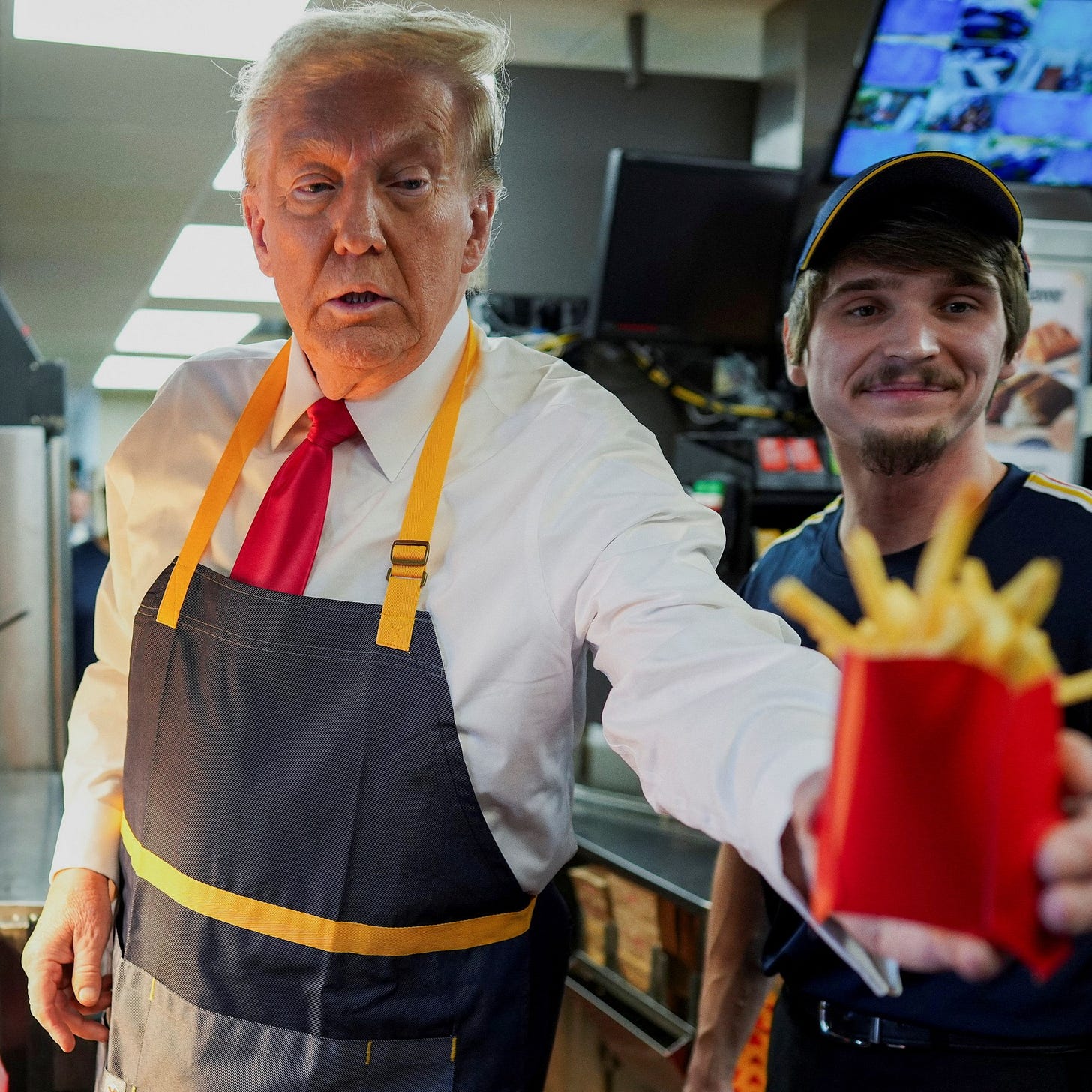Trump visits McDonald’s as Harris speaks to churchgoers in swing state push