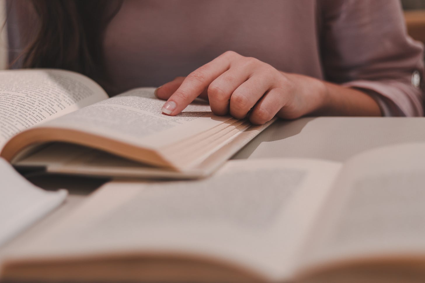 A girl reading a book.