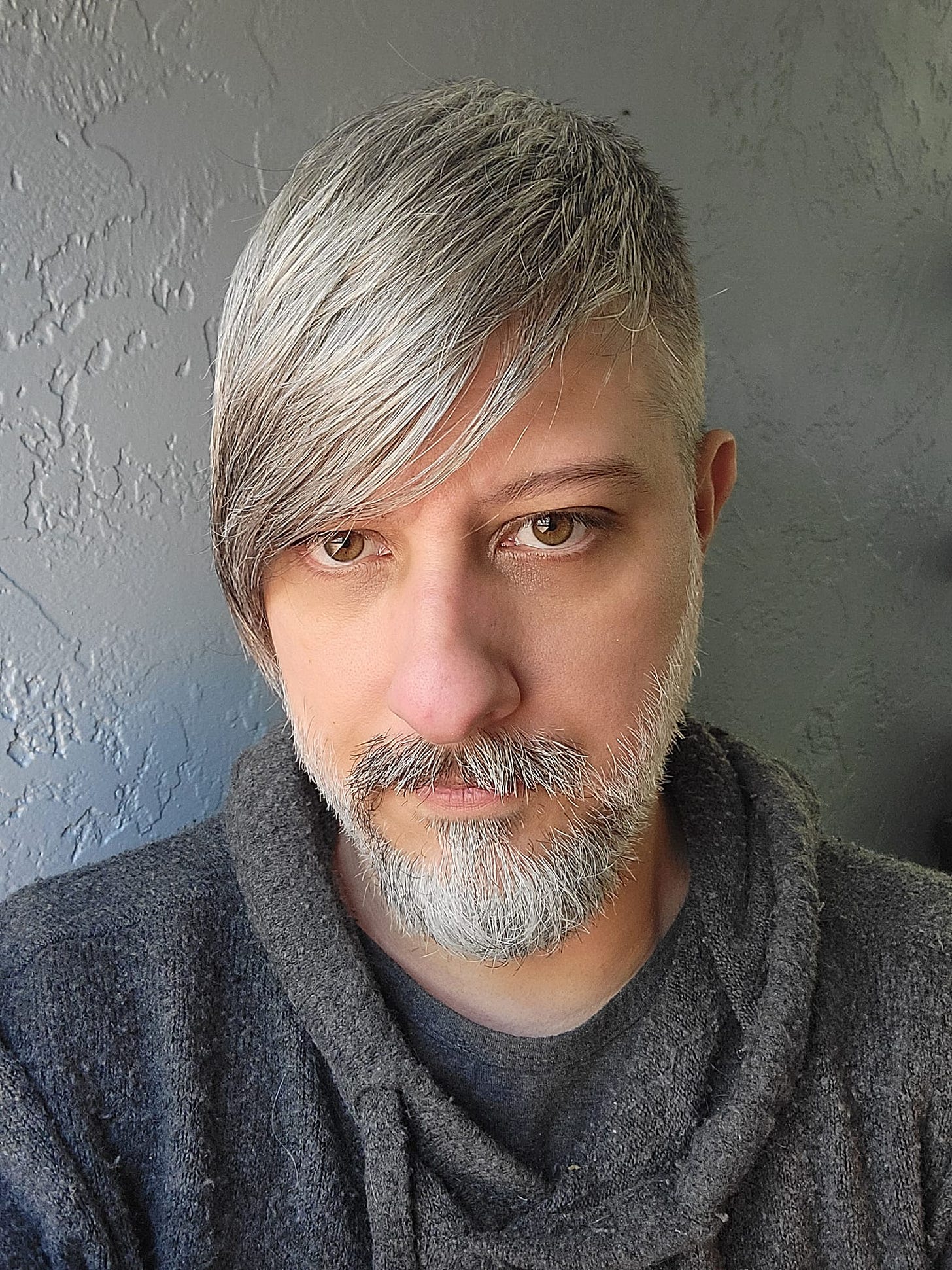 May be an image of 1 person, blonde hair and beard