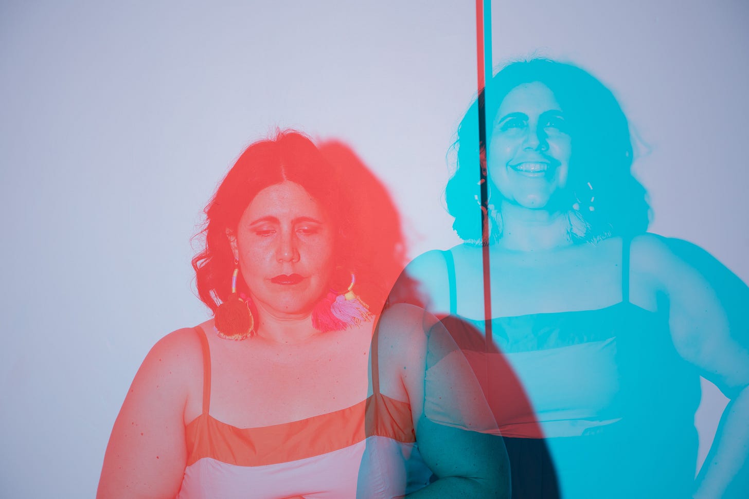 Lauren in a colorful picture with a line down the center, on one side Lauren is scared and sad, and on the other side of the line she is confident and in a power pose