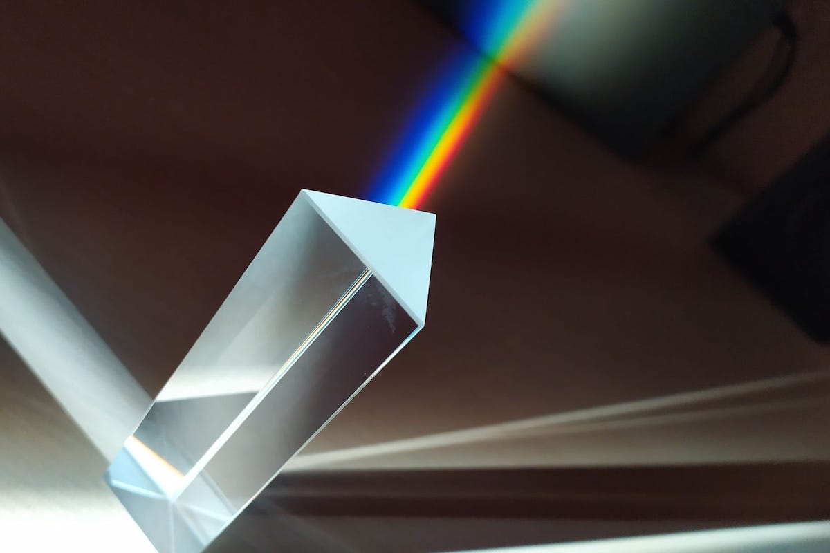 Light refracting through a triangular optical glass prism, representing an outside-in B2B messaging framework and customer research calibration. Light refracting through a triangular optical glass prism, representing an outside-in B2B messaging framework and customer research calibration.