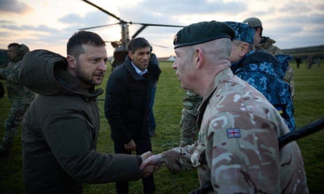 Volodymyr Zelenskiy and Rishi Sunak meet Ukrainian troops being trained at a military facility in Dorset, England. Volodymyr Zelenskiy and Rishi Sunak meet Ukrainian troops being trained at a military facility in Dorset, England.
