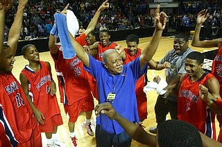 Al Flanigan, then the head coach at Little Rock Parkview, celebrates with his team after winning the 6A state championship in Hot Springs in this March 9, 2012, file photo. (Arkansas Democrat-Gazette file photo)