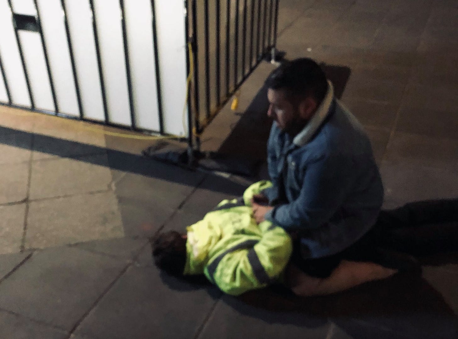 Christian Hull sitting on top of Fake Seizure Guy "like a horse"