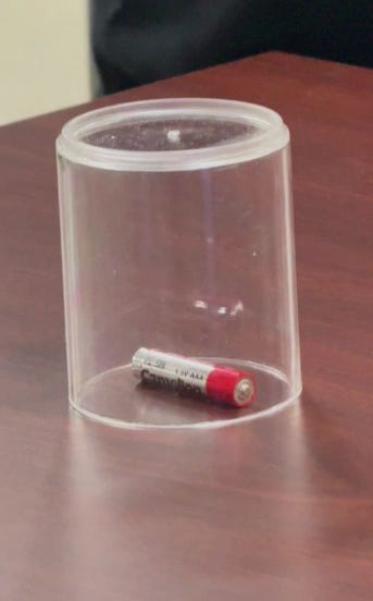 A battery in a plastic container

AI-generated content may be incorrect.