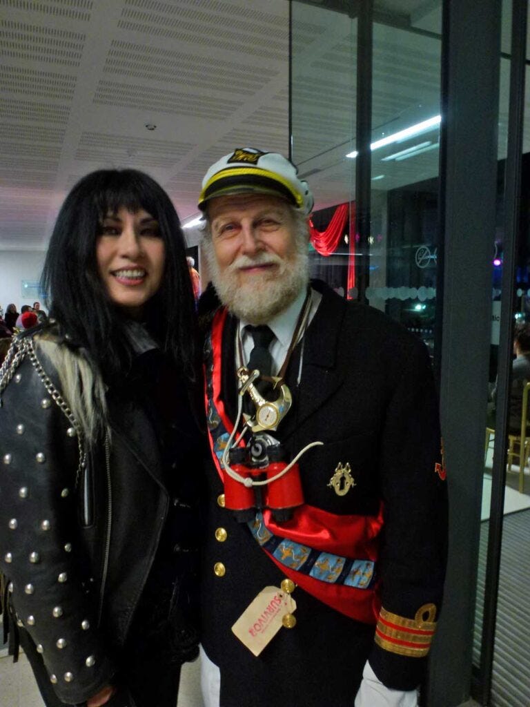 Neil Hornick in costume as Captain Ironside in The Steampunk Opium Wars at the Royal Maritime Museum, Greenwich, with the author and Narrator, Anna Chen.