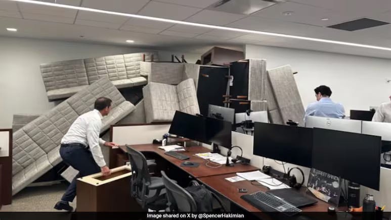 A person standing in a room with many chairs and a desk

AI-generated content may be incorrect.