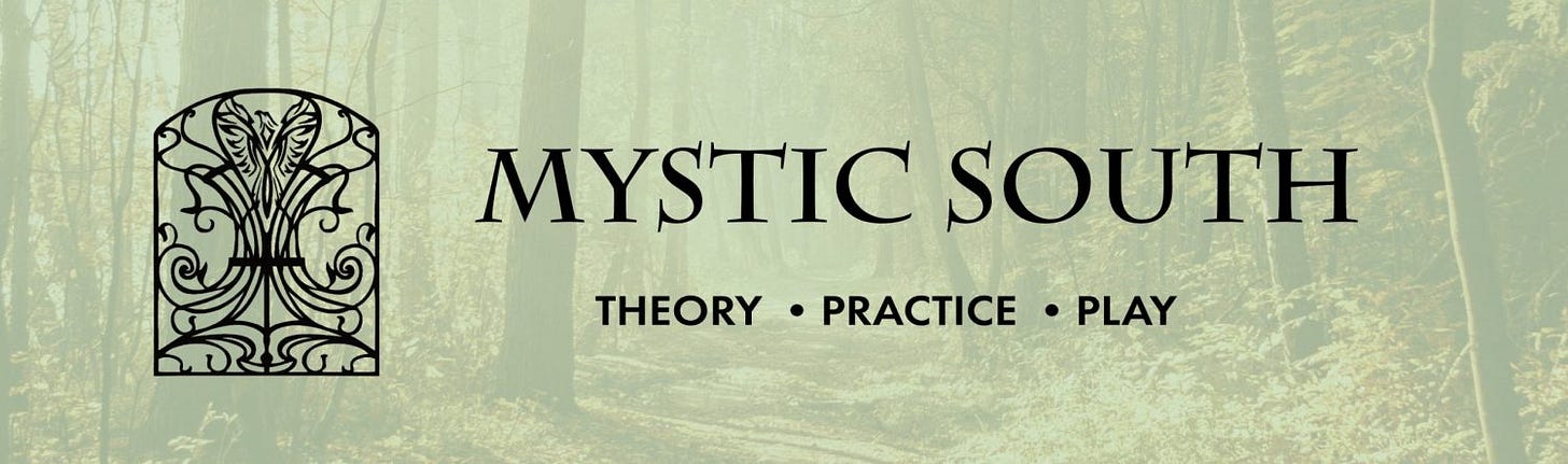 The Mystic South conference logo with the text "Mystic South - Theory - Practice - Play" and a wrought iron gate design on a background of a wooded scene