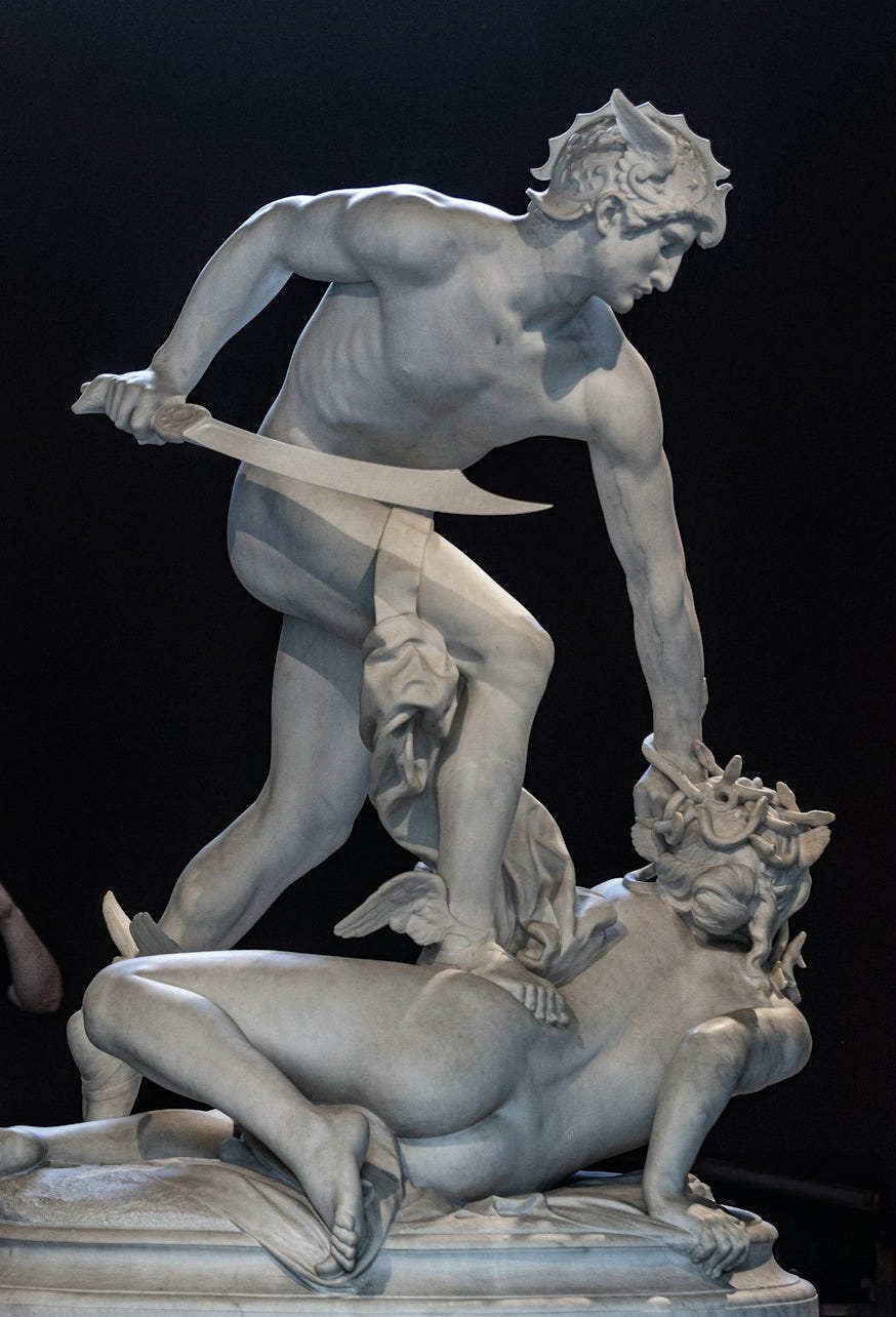 A statue of perseus slaying medusa. A statue of perseus slaying medusa.