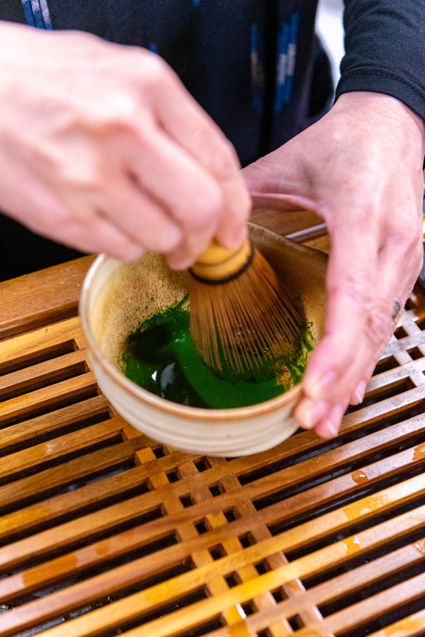 ID: Whisking matcha