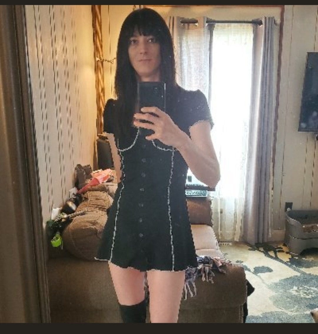May be an image of 1 person, standing and indoor