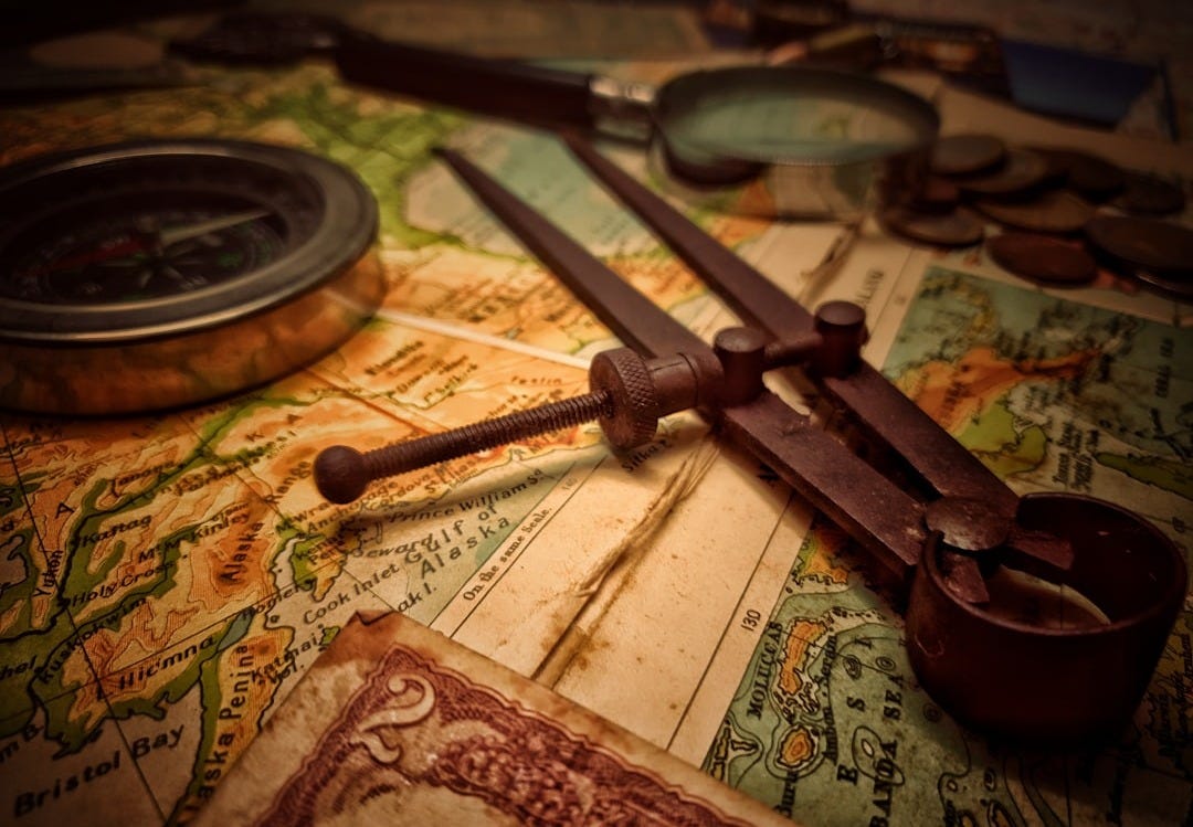 brown wooden handle on white and brown textile brown wooden handle on white and brown textile