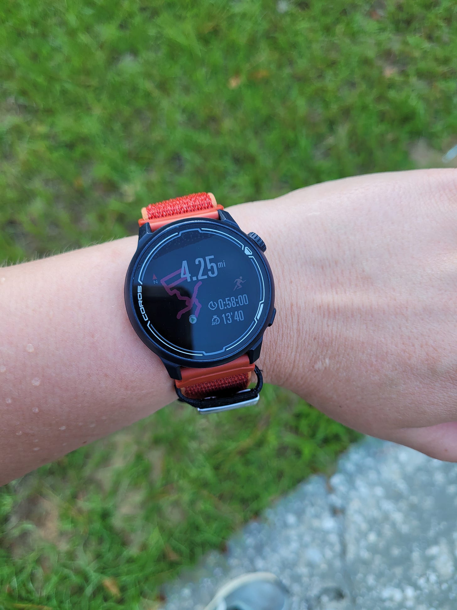 COROS watch on Sydney's wrist after a long run displaying a total distance run of 4.25 miles.